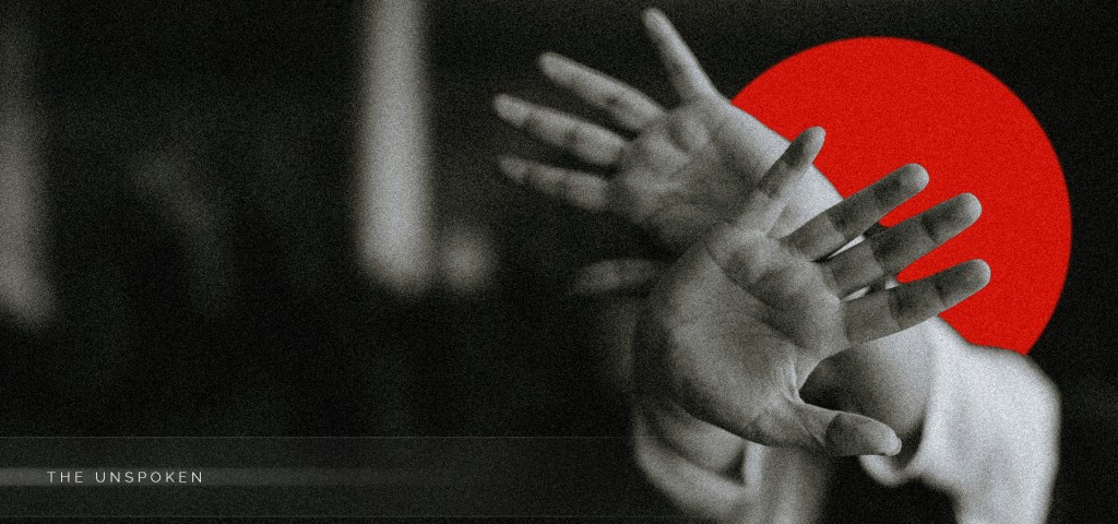 person holding up hands as to say stop